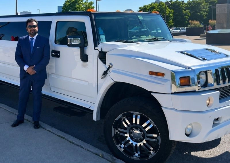 Chauffeur with Hummer Limo